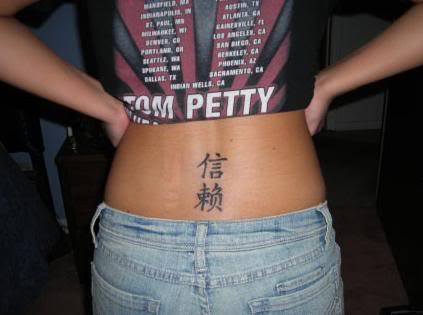 Girl Lower Back Tattoo